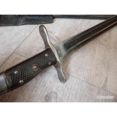 600h600f_00004_Baionnette--glaive-suisse--modele-Vetterli-1878--5-rivets---Lame-sans-dent-de-scie.--Rare.jpg